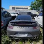 Porsche 911 Turbo S cinza ano 2014 em exposição para leilão online em Itajaí